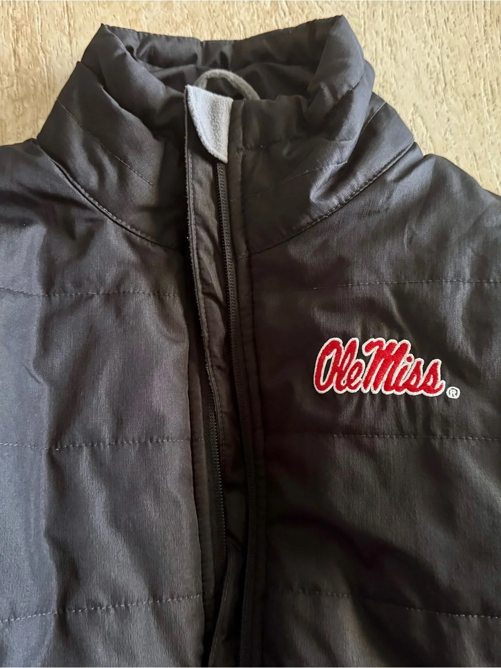 Ole Miss Rebels youth size L (14) Black Quilted Puffer Jacket by Gen2 NWOT